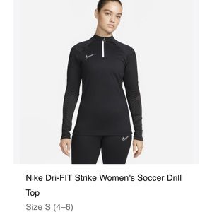 Brand New Nike DriFit Quater Zip Top - New With Tags and Still in plastic.